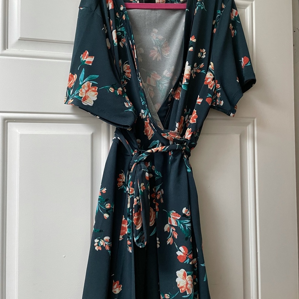 Torrid Size 2 Faux wrap top. This top is incredible flattering!